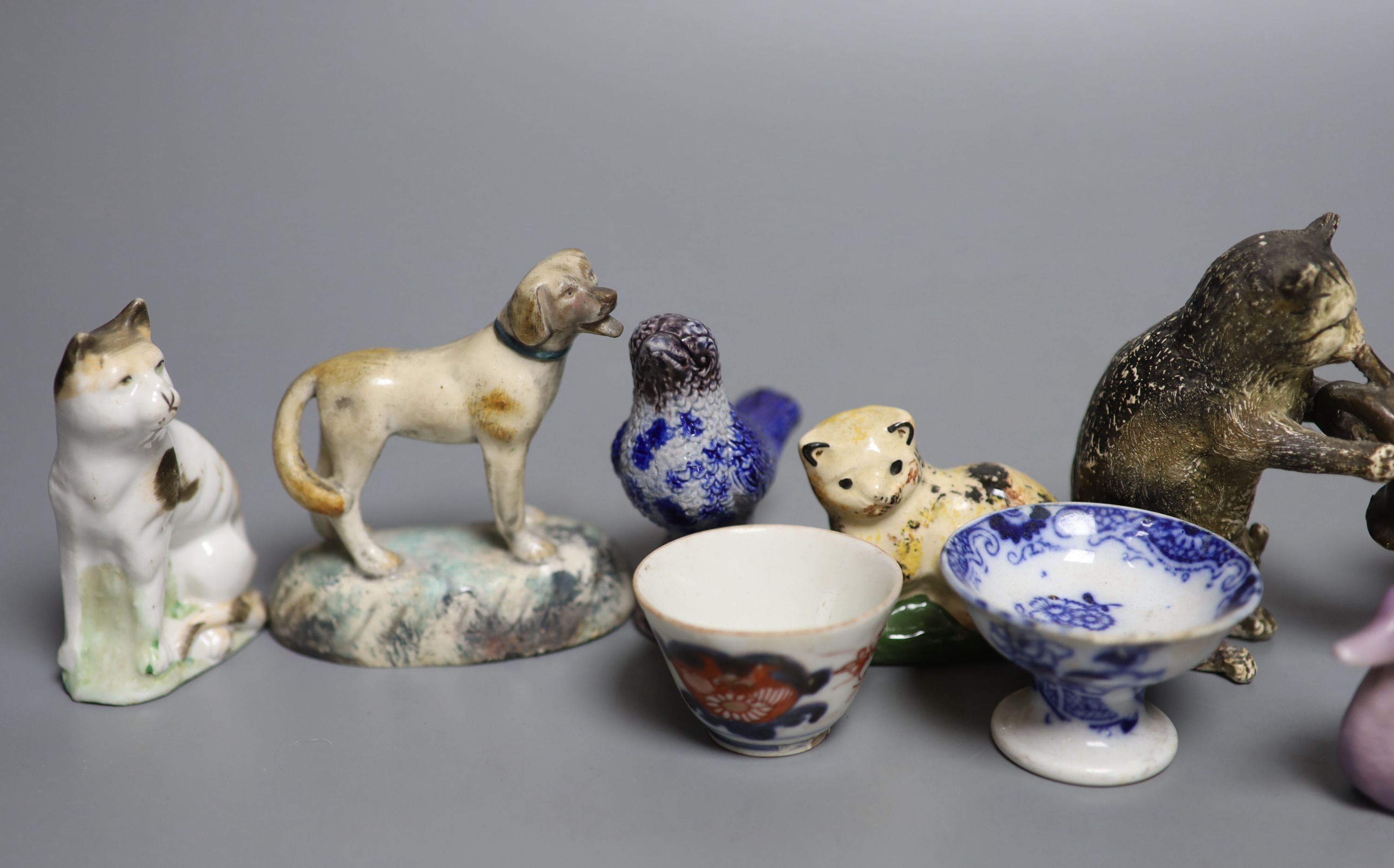 A quantity of miniature ceramic pots, figurines, animal ornaments etc